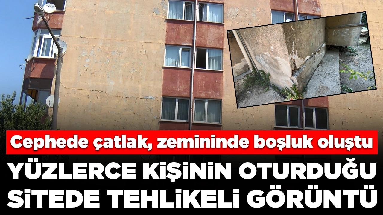 Yüzlerce kişinin oturduğu sitede tehlikeli görüntü: Binaların cephesinde çatlak, zemininde boşluk oluştu