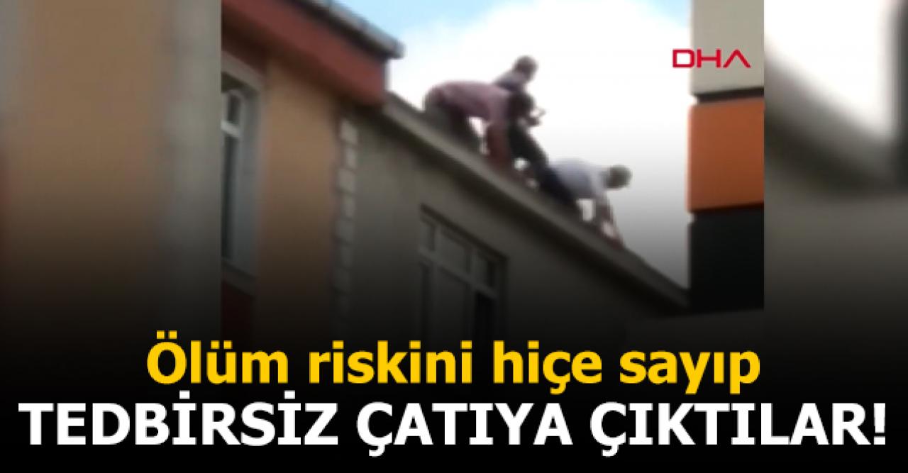 Sultangazi'de çatıya önlemsiz çıkan 3 kişi hayatını hiçe saydı