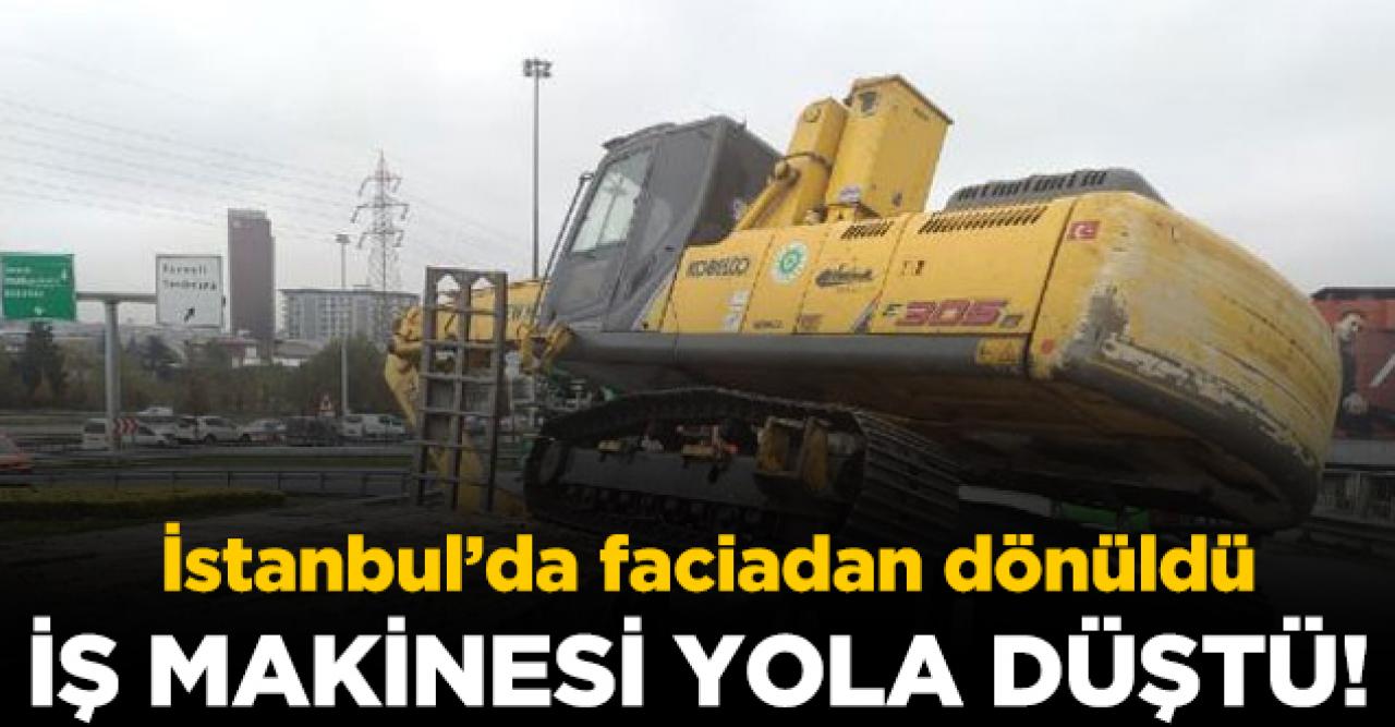 Basın Ekspres yolunda faciadan dönüldü! TIR'ın üzerinden iş makinesi düştü