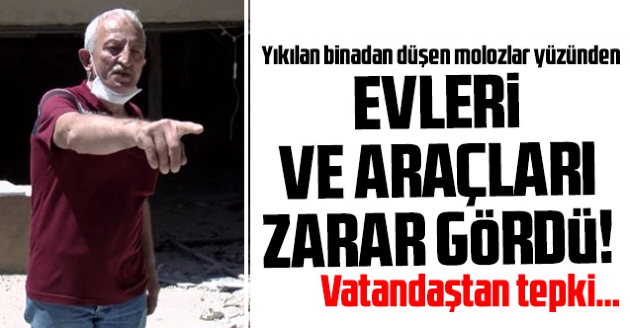 Yıkılan binadan düşen molozlar evlerine ve araçlarına zarar verdi!