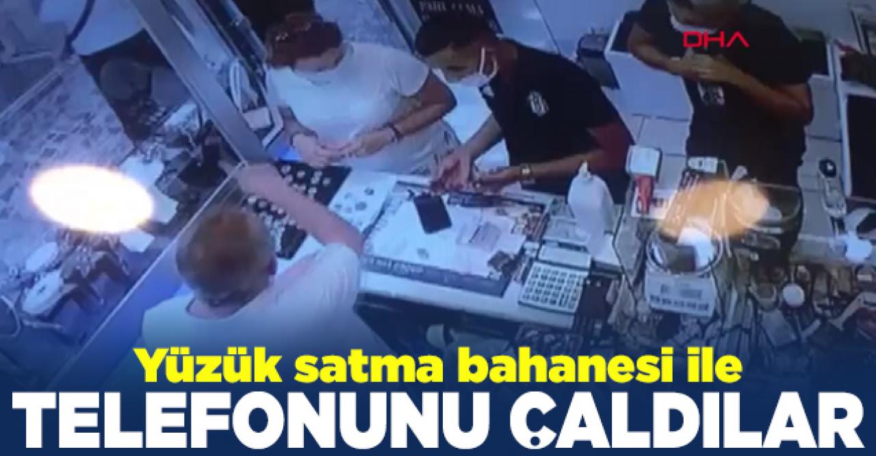 Yüzük satma bahanesi ile telefonunu çaldılar