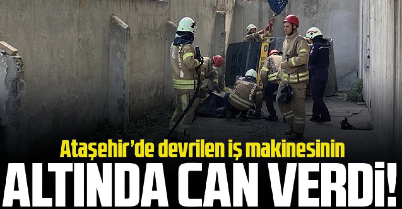 Devrilen iş makinesinin altında can verdi