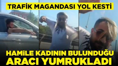 Trafik magandası yol kesti: Hamile kadının bulunduğu aracı yumrukladı