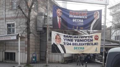 Caminin yakınına asılan seçim pankartı tepkilere neden oldu