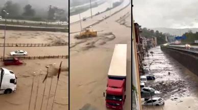 Trabzon'da sağanak hayatı felç etti: Araçlar suya gömüldü, yol trafiğe kapandı