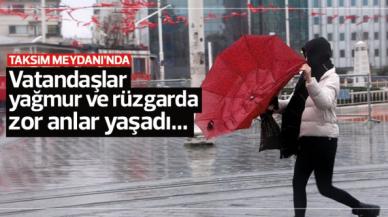 Rüzgar ve yağmur Taksim Meydanı'nda zor anlar yaşattı