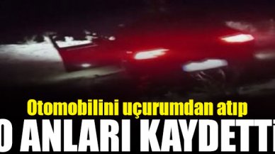 Otomobilini uçurumdan atıp o anları kaydetti