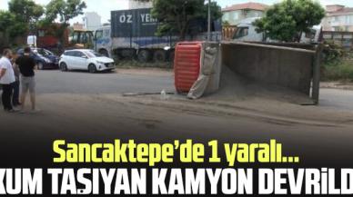 Sancaktepe'de kum yüklü kamyon devrildi