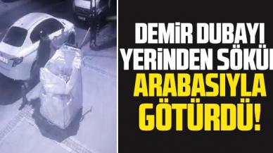 Kaldırımdaki demir dubayı söküp çekçek arabasıyla götürdü