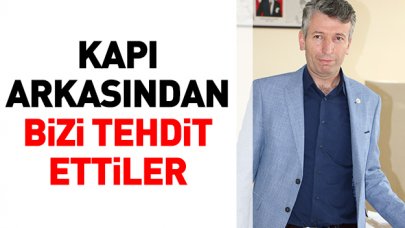 Kapı arkasından bizi tehdit ettiler