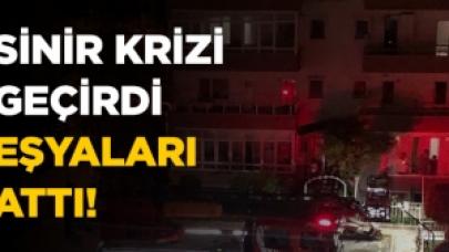 Kriz geçiren kadın eşyalarını camdan aşağı attı