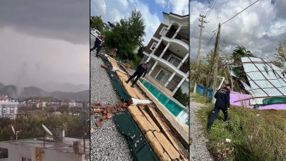 Meteoroloji uyarmıştı: Hortum çatıları uçurdu, ağaç ve direkleri devirdi