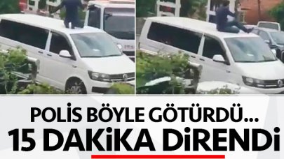 Aracının üstünde otoparka götürüldü