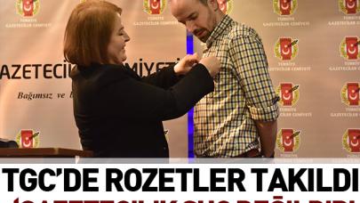 Yeni üyelere rozet takıldı