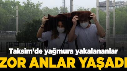 Taksim'de yağmur yakalananlar zor anlar yaşadı