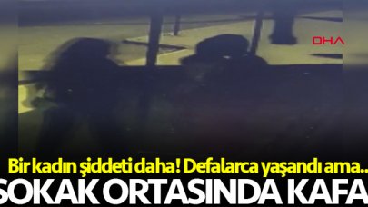 Tartıştığı eşine sokak ortasında kafa attı