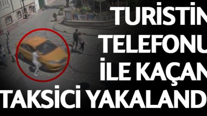 Turistin aracında unuttuğu telefonla kaçan taksici yakalandı