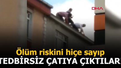 Sultangazi'de çatıya önlemsiz çıkan 3 kişi hayatını hiçe saydı