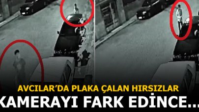 Avcılar'da kamerayı fark eden hırsızlar çaldıkları plakayı yerine taktı