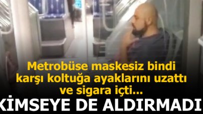 Maske takmadan bindiği metrobüste ayağını karşı koştuğa uzatıp sigara içti!