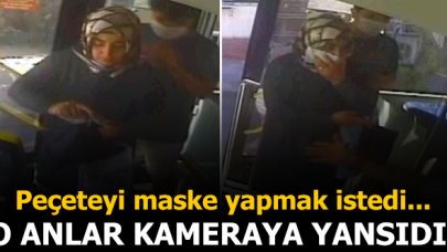 Kadın yolcu peçeteyi maske yapmak istedi ama...