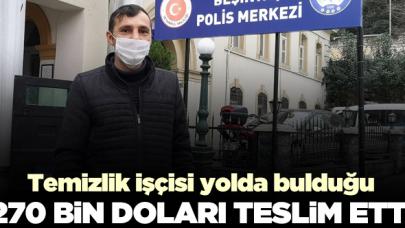 Temizlik işçisi yolda bulduğu 270 bin doları polise teslim etti