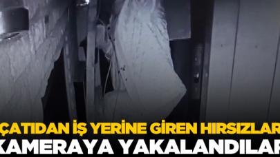 Çatıdan iş yerine giren hırsızlar kamerada!