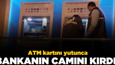 ATM kartını yutunca bankanın camını kırdı