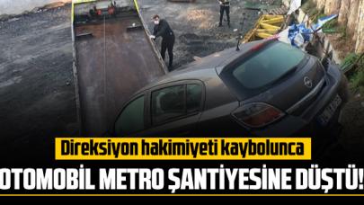 Direksiyon hakimiyeti kaybolan otomobil metro şantiyesine düştü