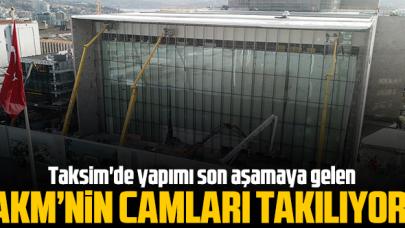 Taksim'deki AKM'de camlar takılıyor