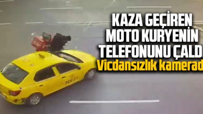 Vicdansızlık kamerada! Şişli'de kaza geçiren motokuryenin telefonunu çaldı