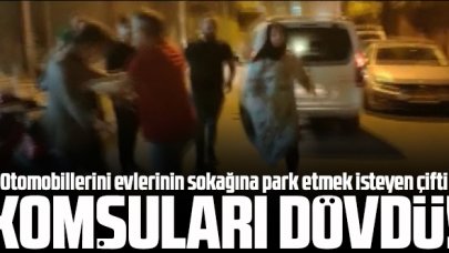 Otomobilini evinin sokağına park etmek isteyen çift komşuları tarafından dövüldü