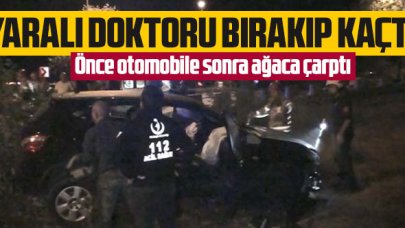 Önce otomobile sonra ağaca çarpıp yaralı doktoru olay yerinde bırakarak kaçtı