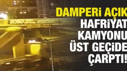 Büyükçekmece'de damperi açık hafriyat kamyonu üst geçide çarptı