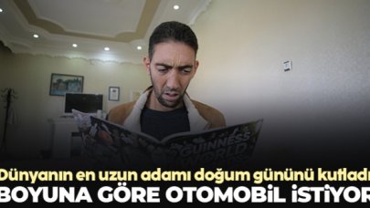 Dünyanın en uzun adamı boyuna uygun otomobil diledi