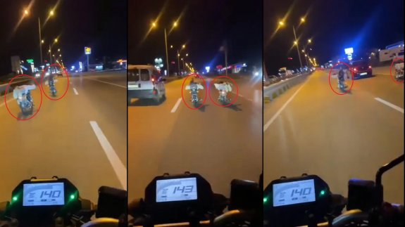 Trafikte tehlikeli anlar: İki motosikletli yüzüstü yatarak yarıştı